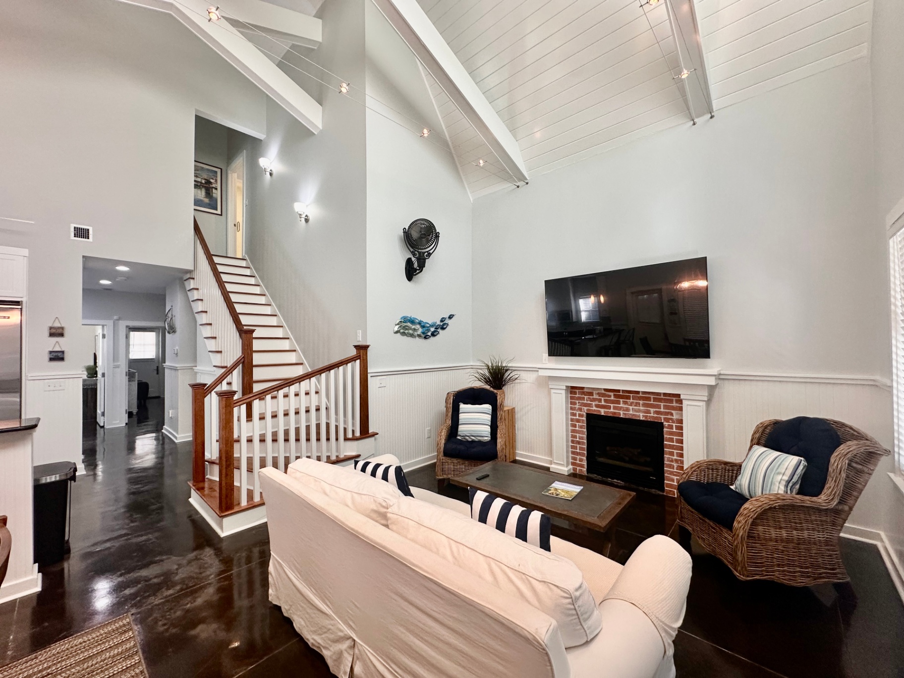 Inviting Living Room with Fireplace and Coastal Charm
