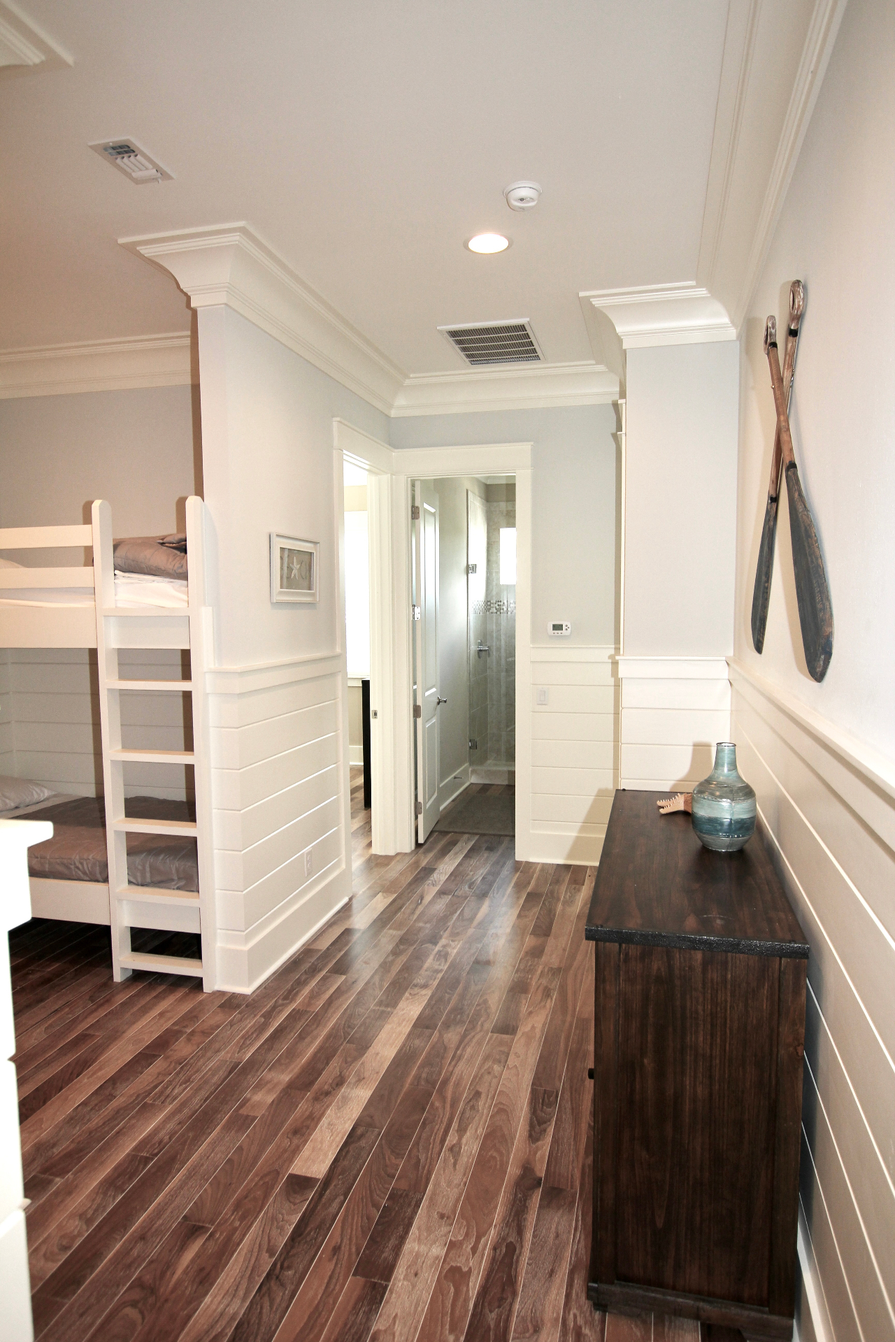 Upstairs Landing with Hardwood Floors and Coastal Charm