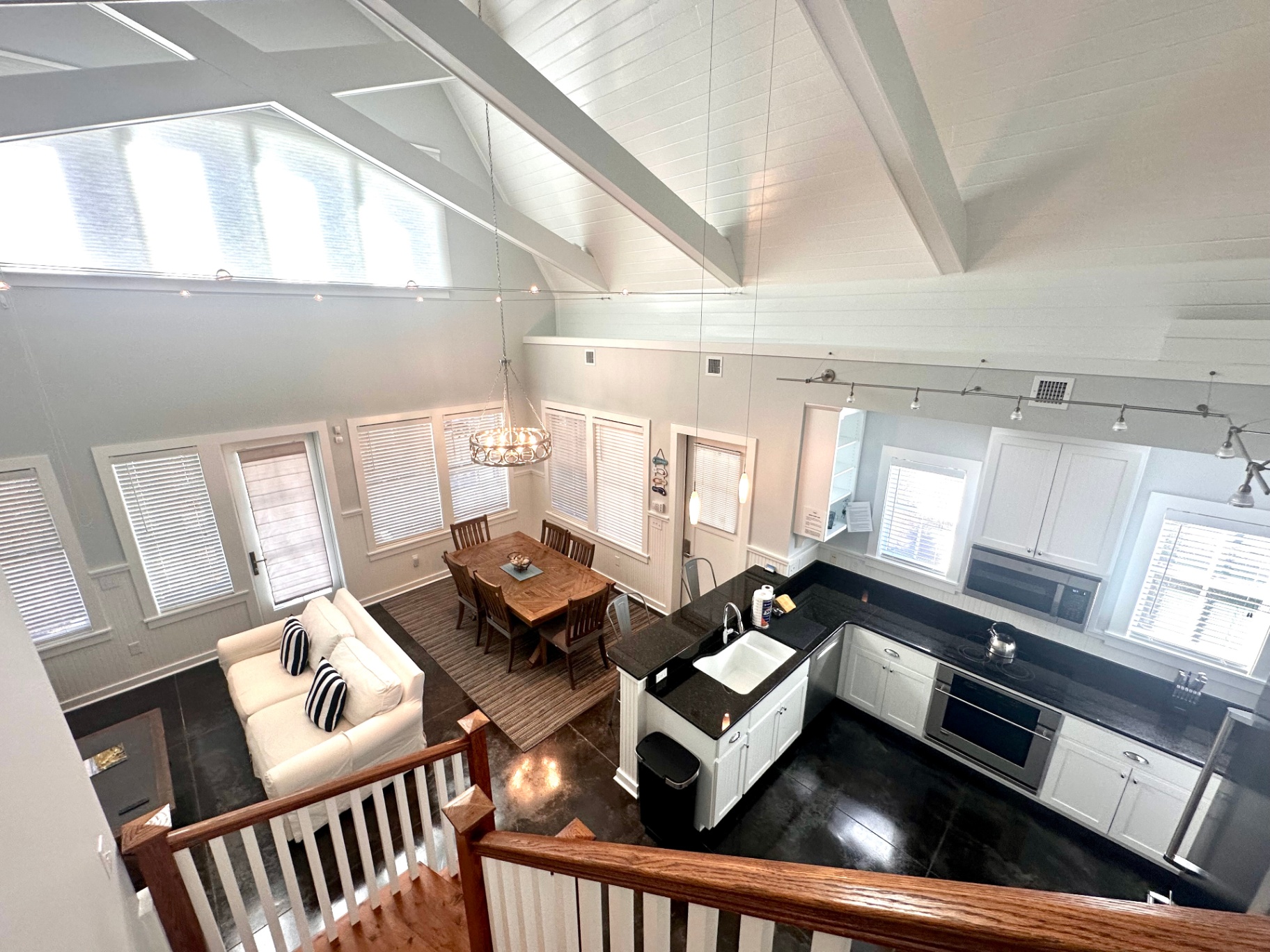 Bright Open Living Area with Soaring Vaulted Ceilings