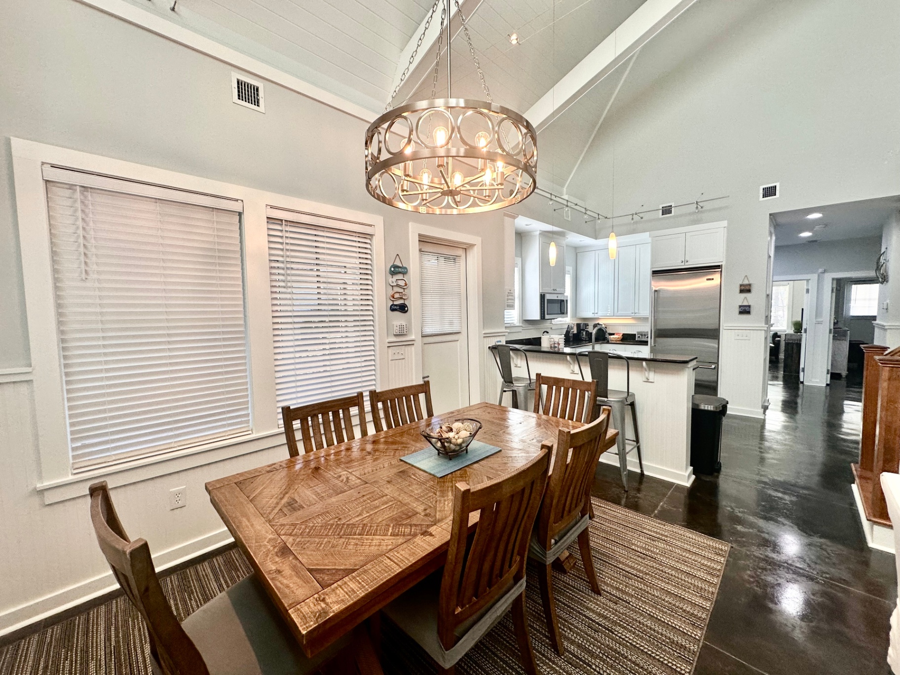 Dining Area with Seating for Six Under Coastal Chandelier