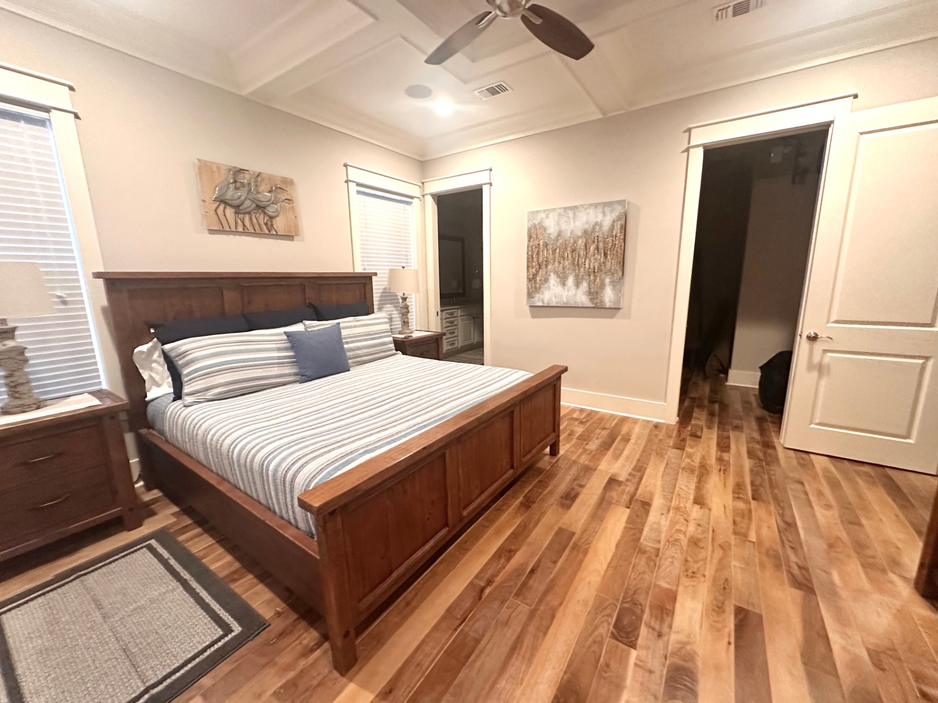 Primary Suite with King Bed and Elegant Coffered Ceiling