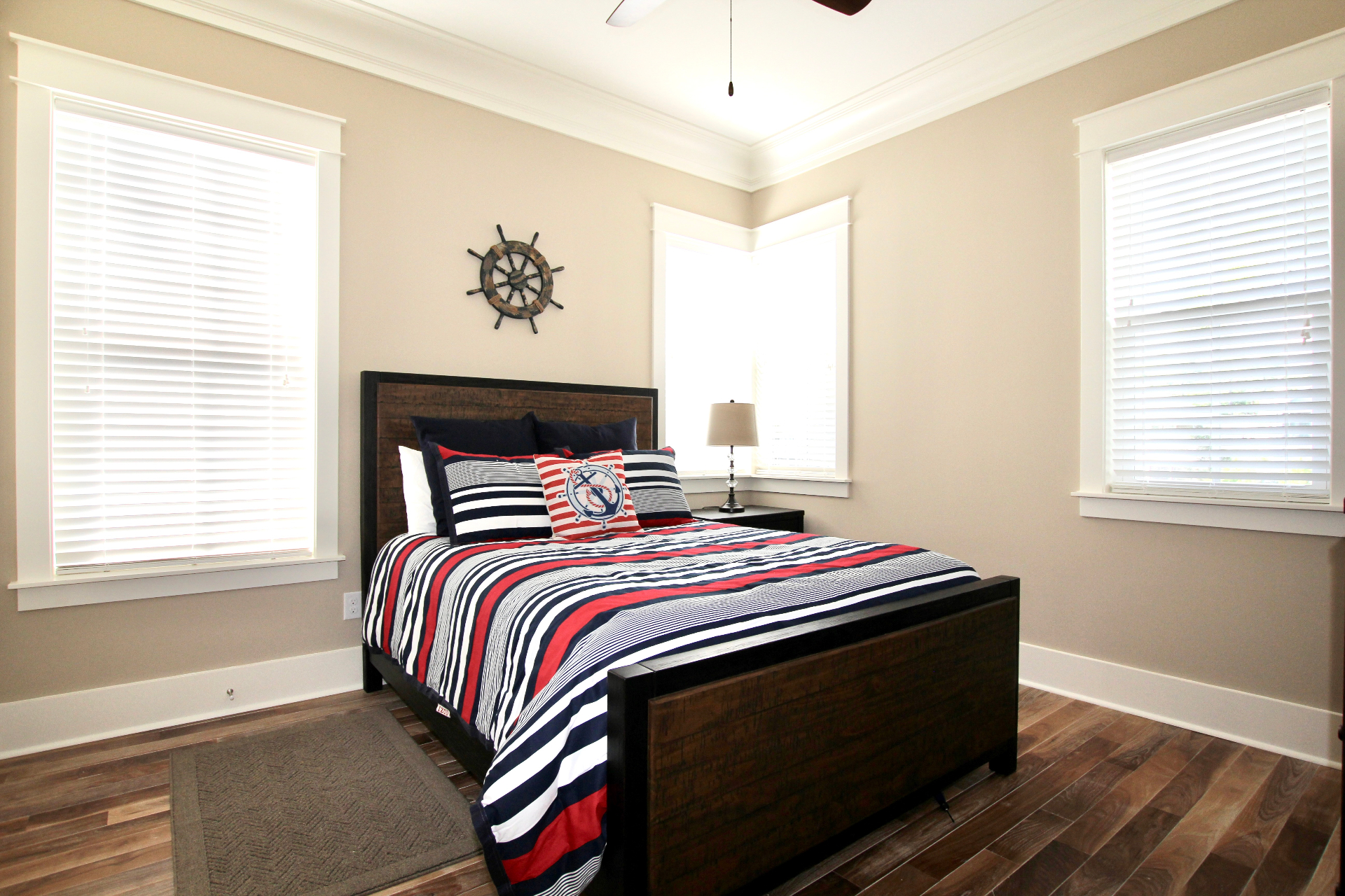 Nautical Guest Bedroom with Corner Windows and Natural Light