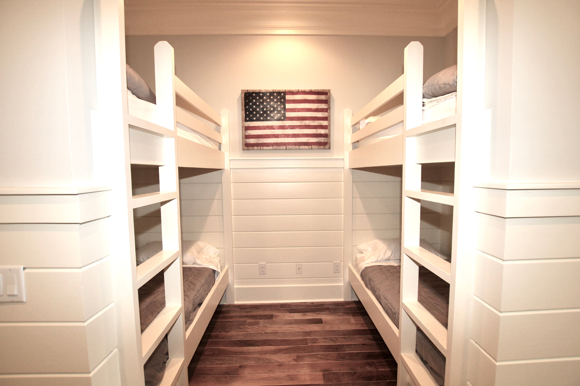 Kids' Bunk Room — Four Built-In Bunks and Patriotic Wall Art